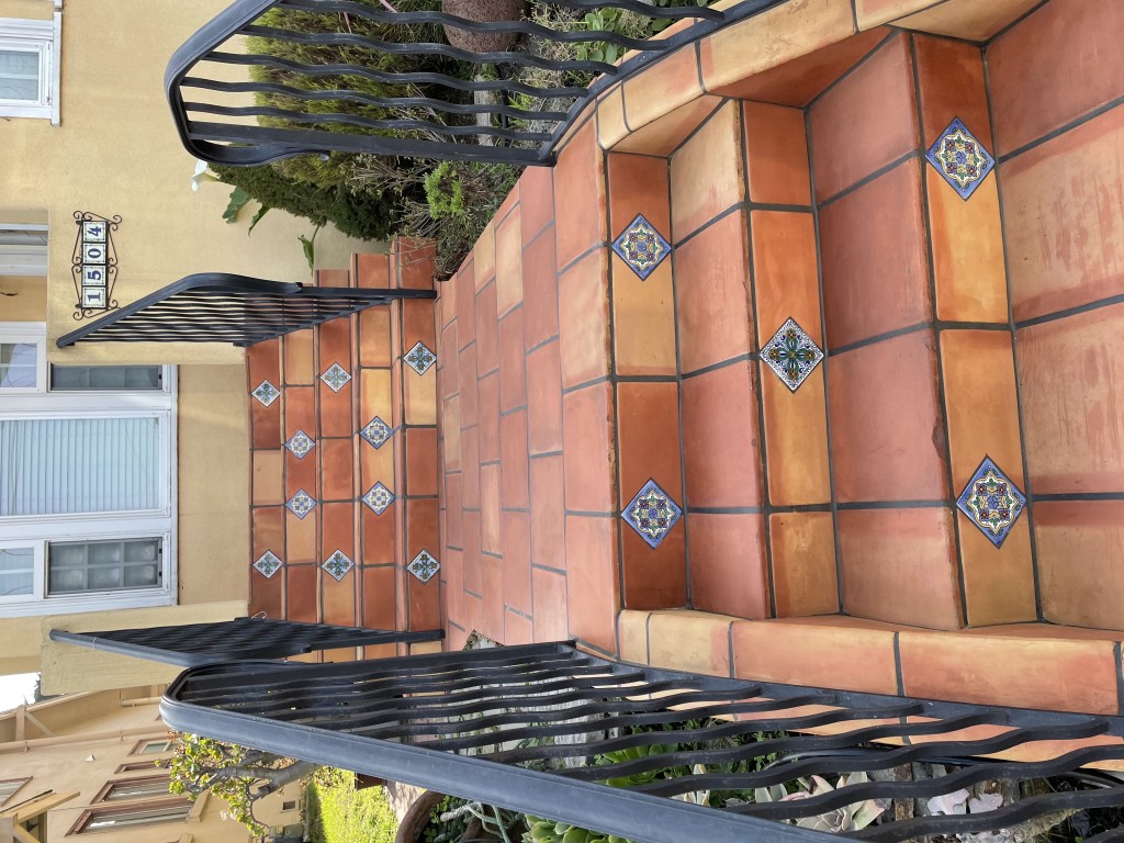 outdoor saltillotile stair entryway with talavera